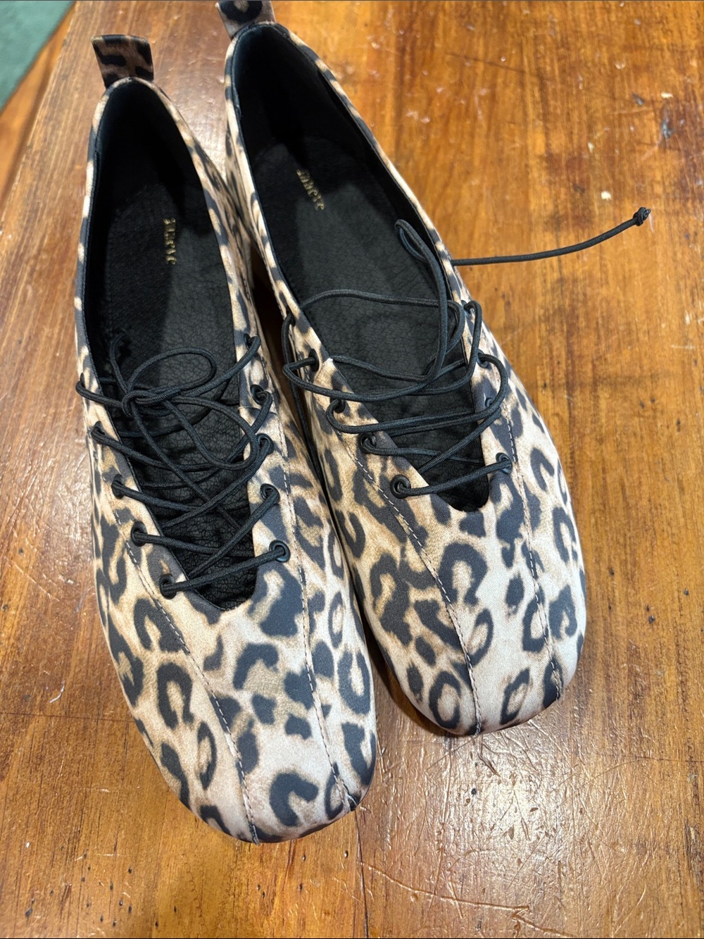 Anthropologie Maeve Leopard-Print Lace-Up Flats in Tan and Black